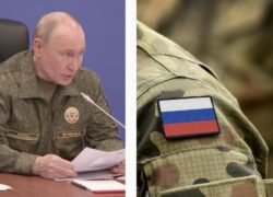 Vladimiras Putinas su karine uniforma ir Rusijos vėliavos antsiuvas